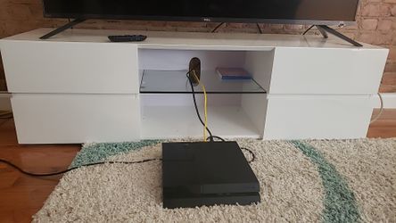 Must go today! White TV Stand. Good as New