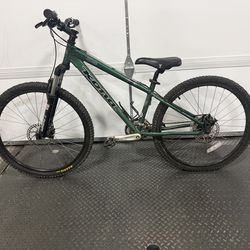 Used Kona blast green mountain bike