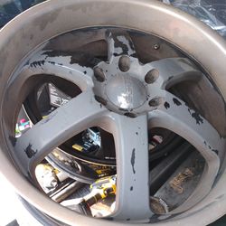 22 Inch 660 Boss I Have 2 Rims Black And Aluminum Around ,$150
