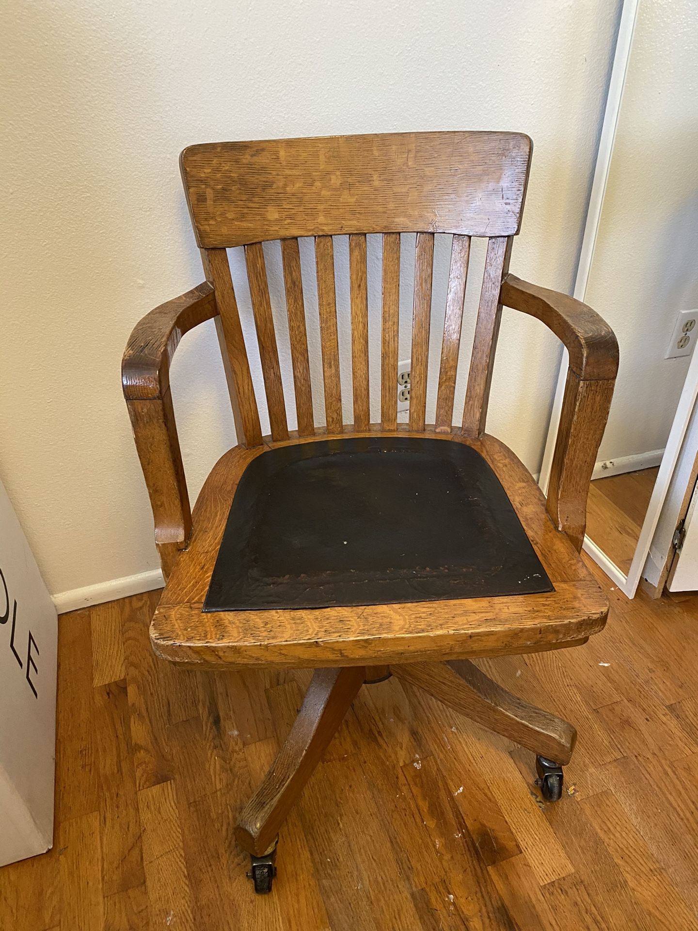 Antique oak swivel chair