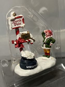 A Lake With Tree And Elf By North Pole