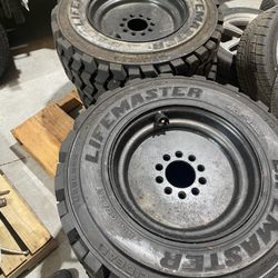 Skid Steer Tires New With Good Used Rims.  10-16.5