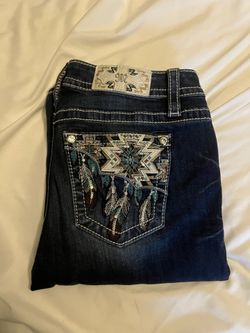 Dark wash, boot cut miss me jeans