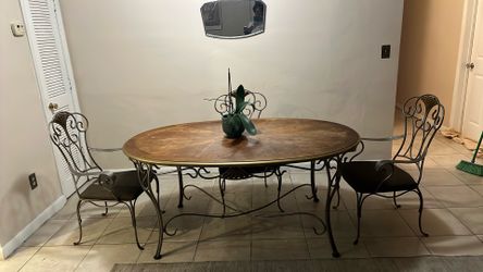 Elegant wood and wrought iron table