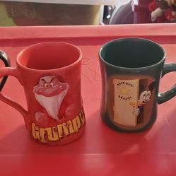 4 Mugs 3 from DISNEY STORE 1 Warner Brothers 