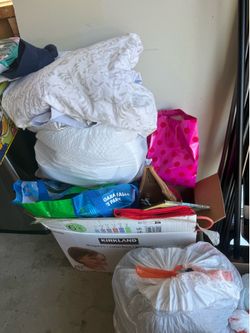 clothes, some toys, and curtain rods. Free