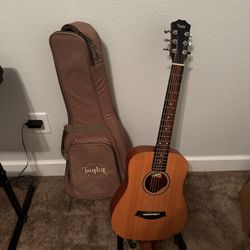 Taylor BT2-L Baby Taylor Acoustic Guitar, stand & caring case.