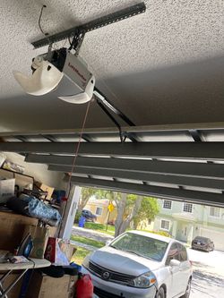 Overhead Garage Door Opener Broken Spring Off Track Replace Adjustment And Parts