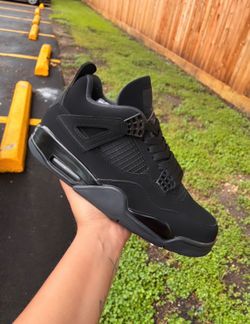 Black Cat Jordan 4s