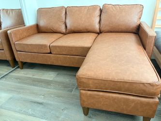 a 3-seater vegan leather couch in brown