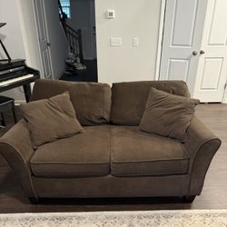Brown loveseat