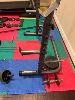 Weider XRS 20 Adjustable Bench with Olympic Squat Rack and Preacher Pad.