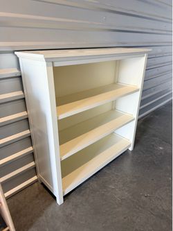 White wood four tier shelving