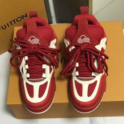 The men's red sneakers are brand new