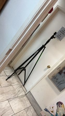 Black Tripod Stand with Green Accents