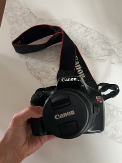 Canon Rebel T3 + 18–55mm lens + 75–300mm lens + battery