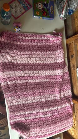 Crocheted blanket pinks