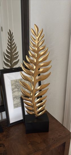 Gold Leaf Sculpture on Black Base