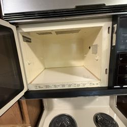 OR LATCH TO LEFT. EN SET" KNOB "OFF spacemaker MICROWAVE COOKING CENTER