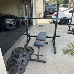 Bench press/squat rack with 6ft bar plus 240lbs of Olympic weights