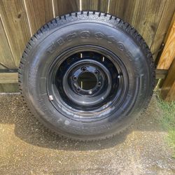 Firestone Wilderness tire on a black steel wheel 225/75/ R15- recommend wheel only 