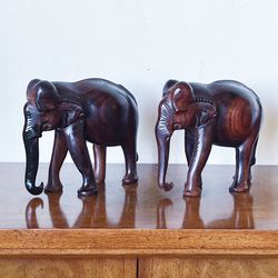 Mid-Century Hand-Carved Asian Elephants in Wood, a Pair  Wonderful character with inlaid eyes  Measure approx: 6H x 7L x 4W  Please visit my other lis