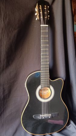 Ebigoneline guitar read description