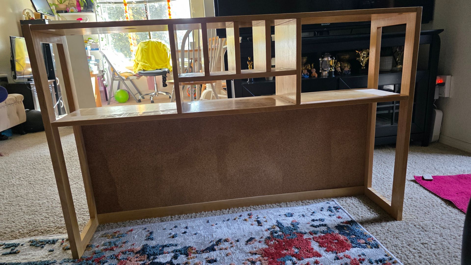 Versatile wood shelf with cork board