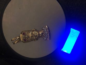 SOLID GOLD PHAROAH WITH DIAMOND AND RUBY