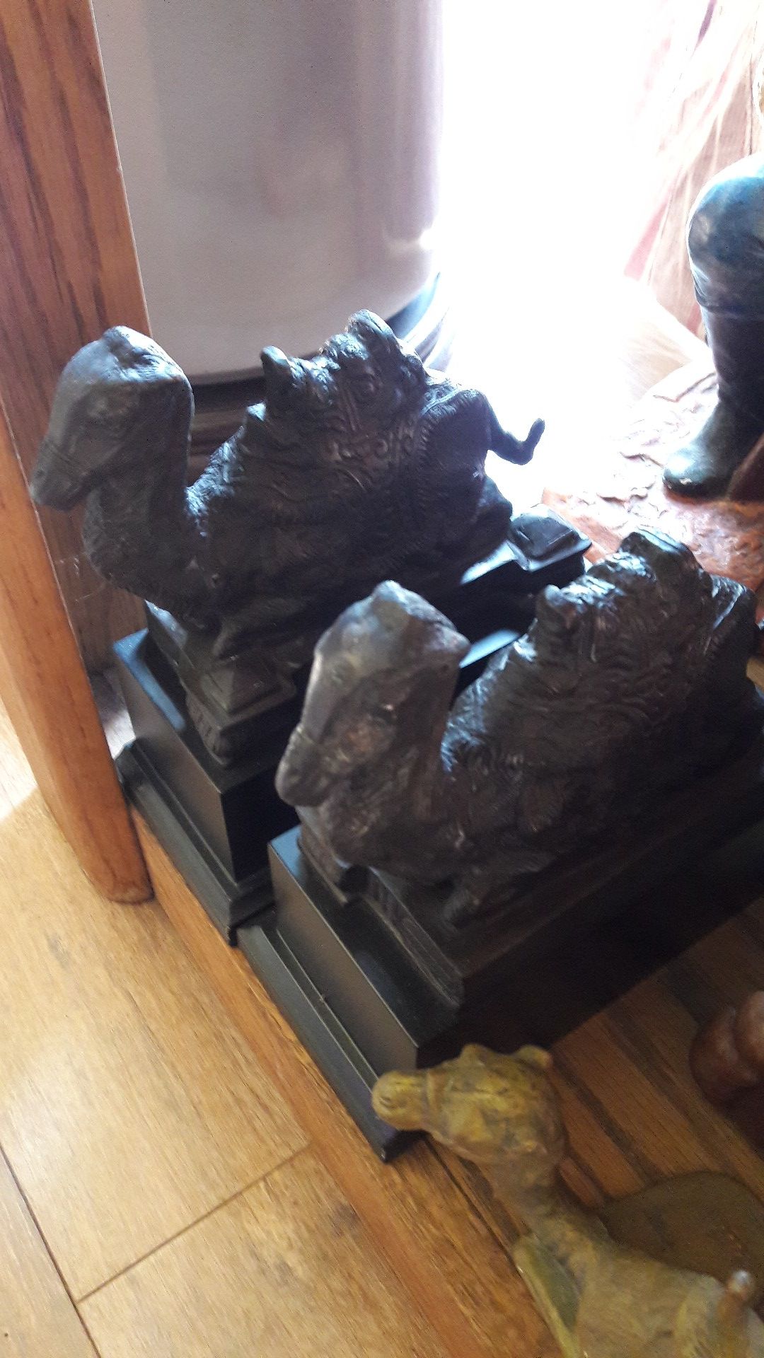 A pair of Metal camels bookend