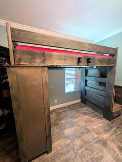 Rustic Wood Loft Bed with Built-in Dresser and Shelving