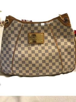 Louis Vuitton bag and cosmetic bag