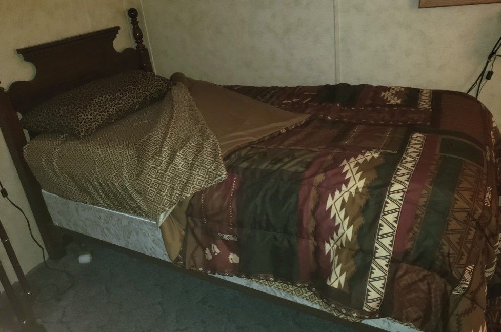 Twin bed with mattress and box springs