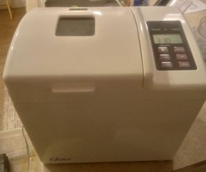 Oster deluxe automatic bread and dough maker