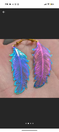 Free shipping! Necklaces available too! Iridescent rainbow feather jewelry