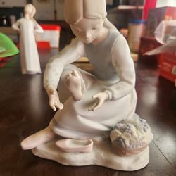 Lladro NAO porcelain figurine young girl sitting massaging feet