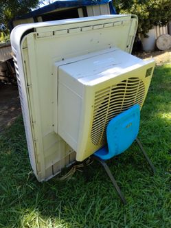 Window evaporative cooler