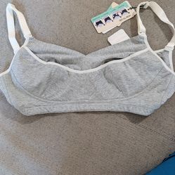 Brand new tags still on and never worn, hands-free pumping and nursing bra size 34d 88% cotton 11% spandex