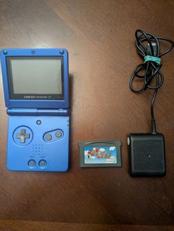Nintendo Game Boy Advance SP Bundle — Cobalt Blue — $140 **