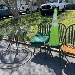 Free table and  3 chairs (chairs don’t match the table)