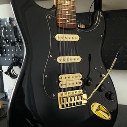 Fender Squier Affinity Strat Black electric guitar. 
