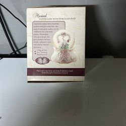 Musical Waterglobe With Porceline Base $15