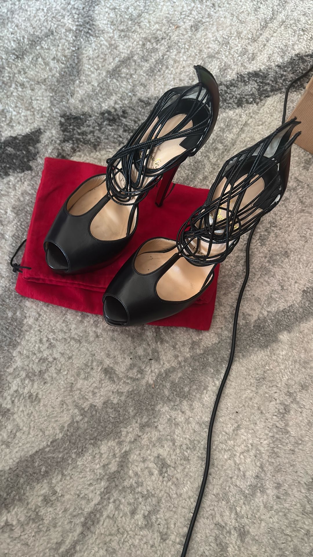 Size 38 Christian Louboutin elastic strap stiletto heels