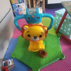 Fisher-Price Bounce & Spin Lion Stationary Ride-On Electronic Learning Toy for Toddlers