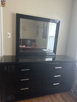 Dresser with a mirror