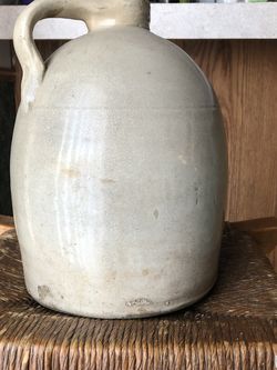 White Stoneware Jug In Great Shape ,has A Cork Stuck In Top Of It.Very Nice Shape