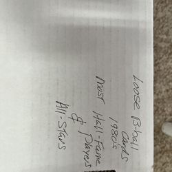 Large box of loose baseball cards in plastic sleeves