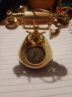 Used miniature gold-tone Timex old fashioned telephone 📞 clock ⏰ for sale.