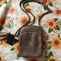 Rustic brown crossbody bag with floral design and tassel #crossbodybag #cute #adjustable strap