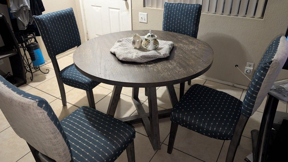 Table And 4 Chairs